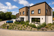 Teak composite cladding installed on modern house exteriors