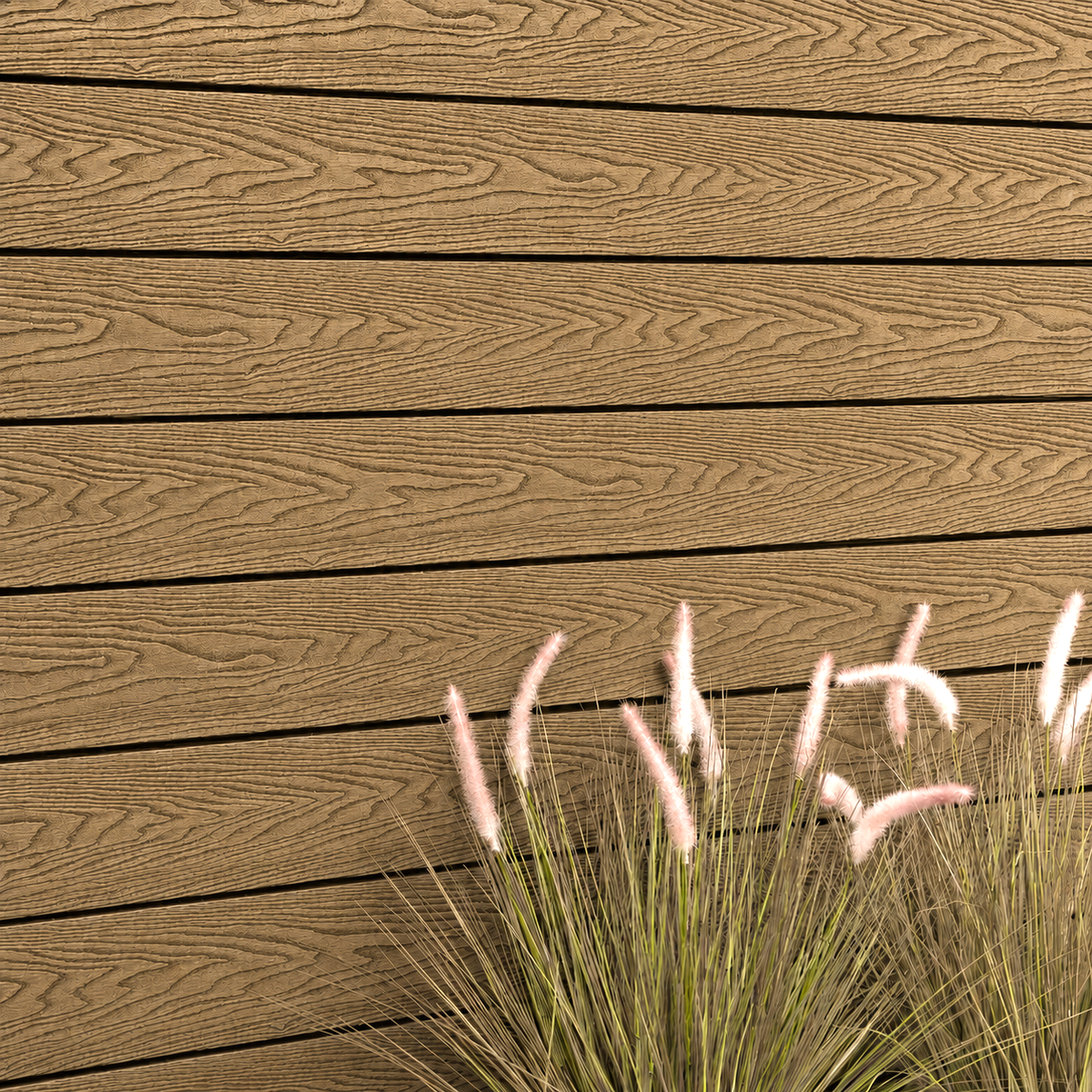 Close-up of teak composite cladding beside ornamental grass