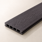 Single coffee composite decking board on a light background
