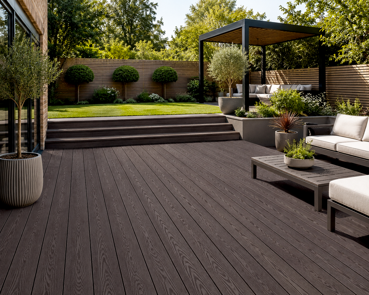Coffee composite decking in a landscaped garden with a pergola