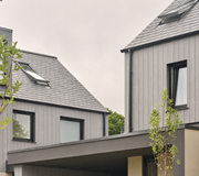 Light grey composite cladding on contemporary house exteriors