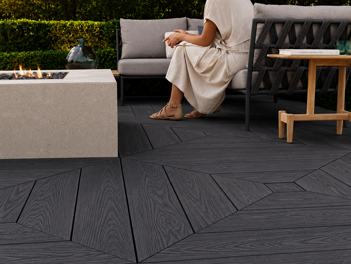 Close-up of charcoal composite decking beside outdoor seating