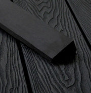 Charcoal composite L trim positioned on matching decking