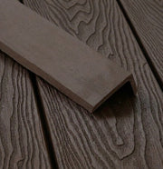 Coffee composite L trim positioned on matching decking