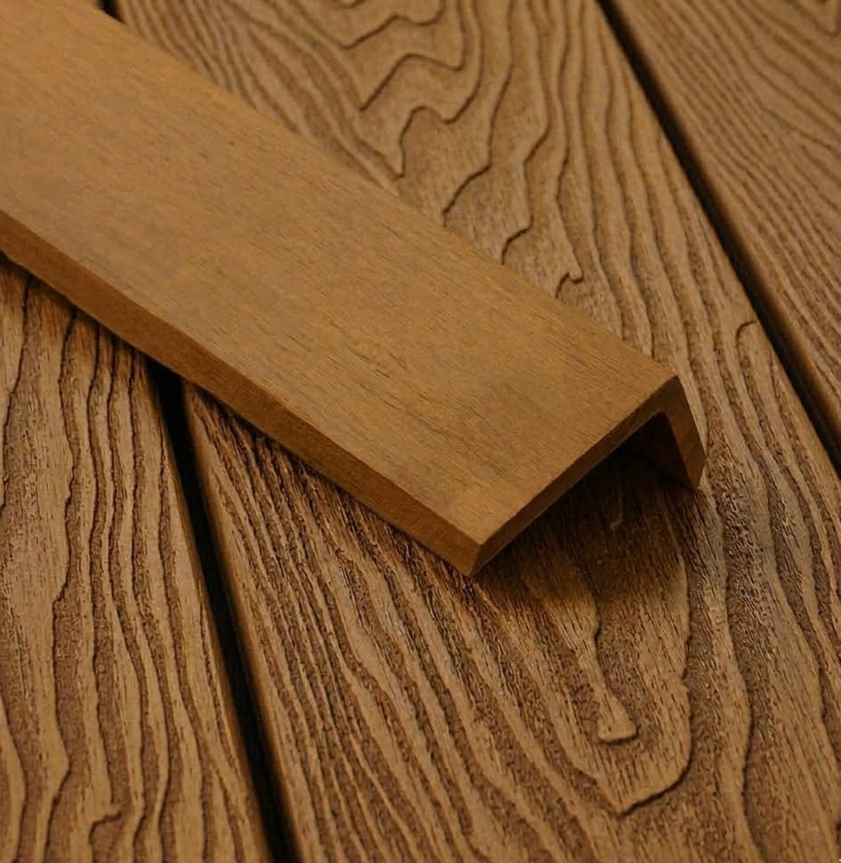 Teak composite L trim positioned on matching decking