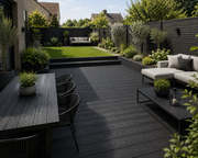 Charcoal composite decking in a landscaped garden seating area