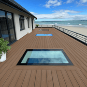 Coffee composite decking on a coastal rooftop terrace