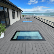 Dark Grey composite decking on a coastal rooftop terrace