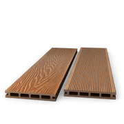 Two coffee composite decking boards showing woodgrain and grooved faces