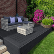 Raised charcoal composite deck with garden seating and planting