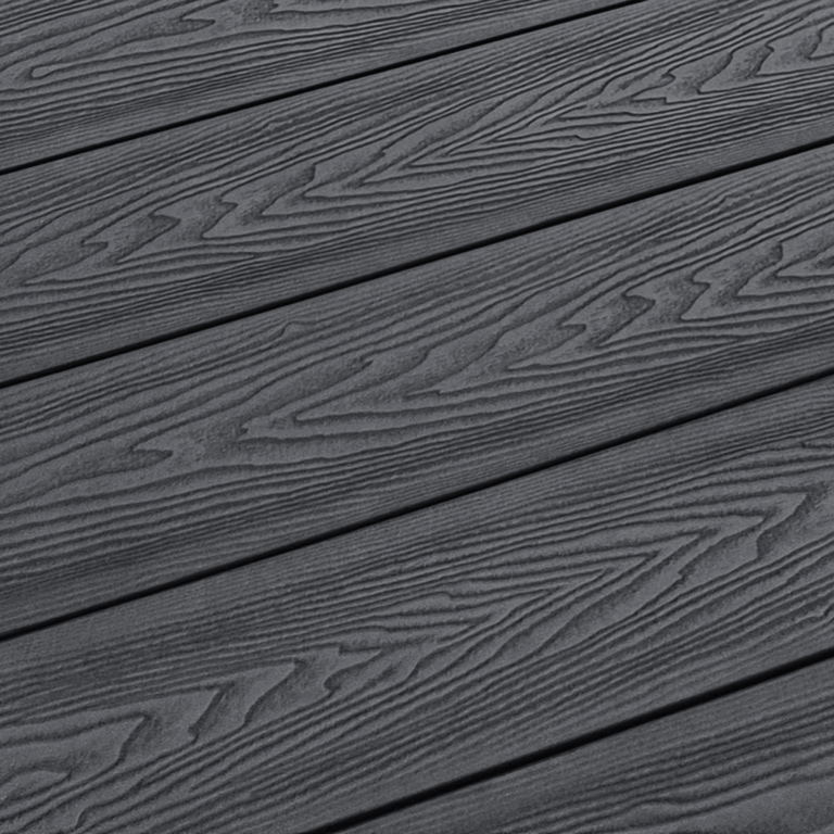 Close-up of dark grey composite decking woodgrain surface