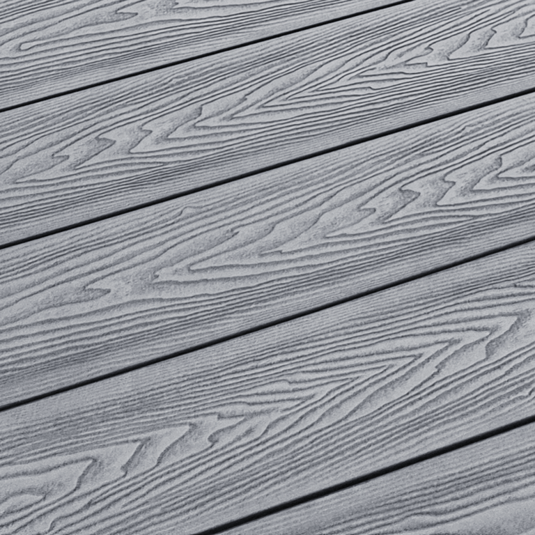 Close-up of light grey composite decking woodgrain surface