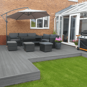 Dark Grey composite deck with garden seating and a parasol
