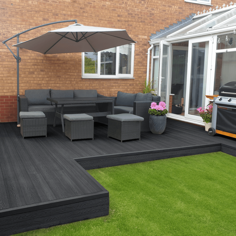 Charcoal composite deck with garden seating and a parasol