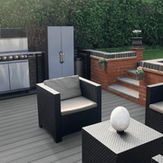Dark Grey composite decking with an outdoor kitchen and seating