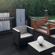 Charcoal composite decking with an outdoor kitchen and seating