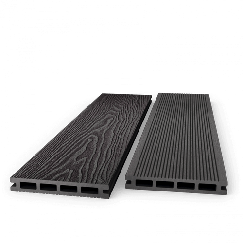 Two charcoal composite decking boards showing woodgrain and grooved faces