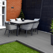 Dark Grey composite decking with garden dining furniture