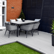 Light Grey composite decking with garden dining furniture
