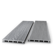 Two light grey composite decking boards showing woodgrain and grooved faces