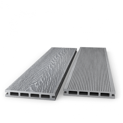 Two light grey composite decking boards showing woodgrain and grooved faces