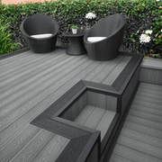Dark Grey composite decking with a contrasting border and steps