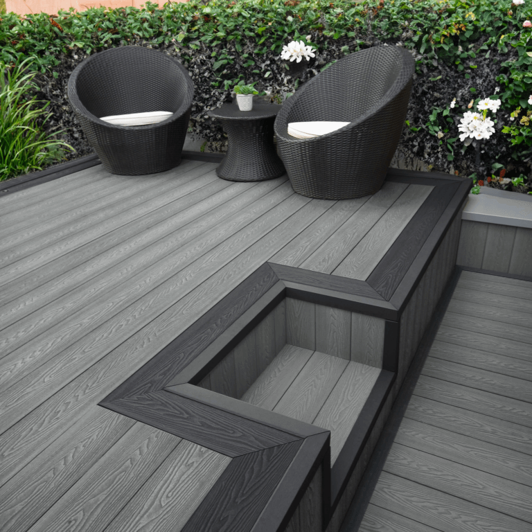 Dark Grey composite decking with a contrasting border and steps