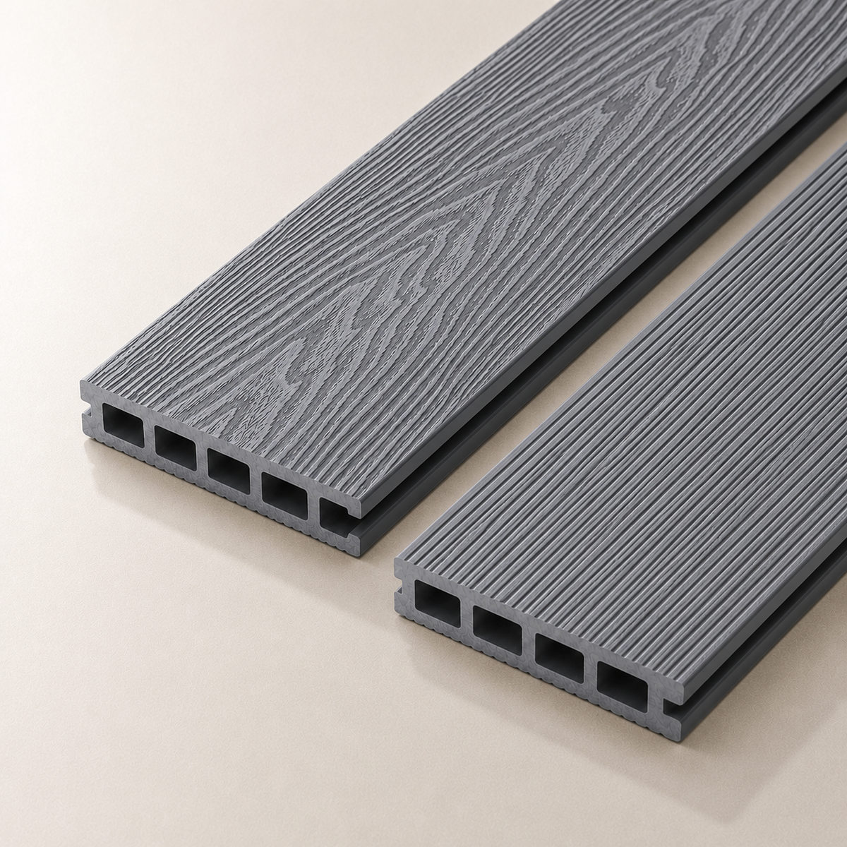Two light grey composite decking boards on a light background