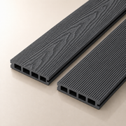 Two 4m dark grey composite decking boards on a light background